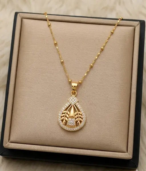 Nakshu Designer Golden Leaf Pattern AD Stone Pendant Necklace for Women