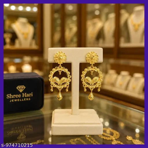 These gold-plated chandelier-style earrings feature intricate floral stud tops and delicate teardrop pendants